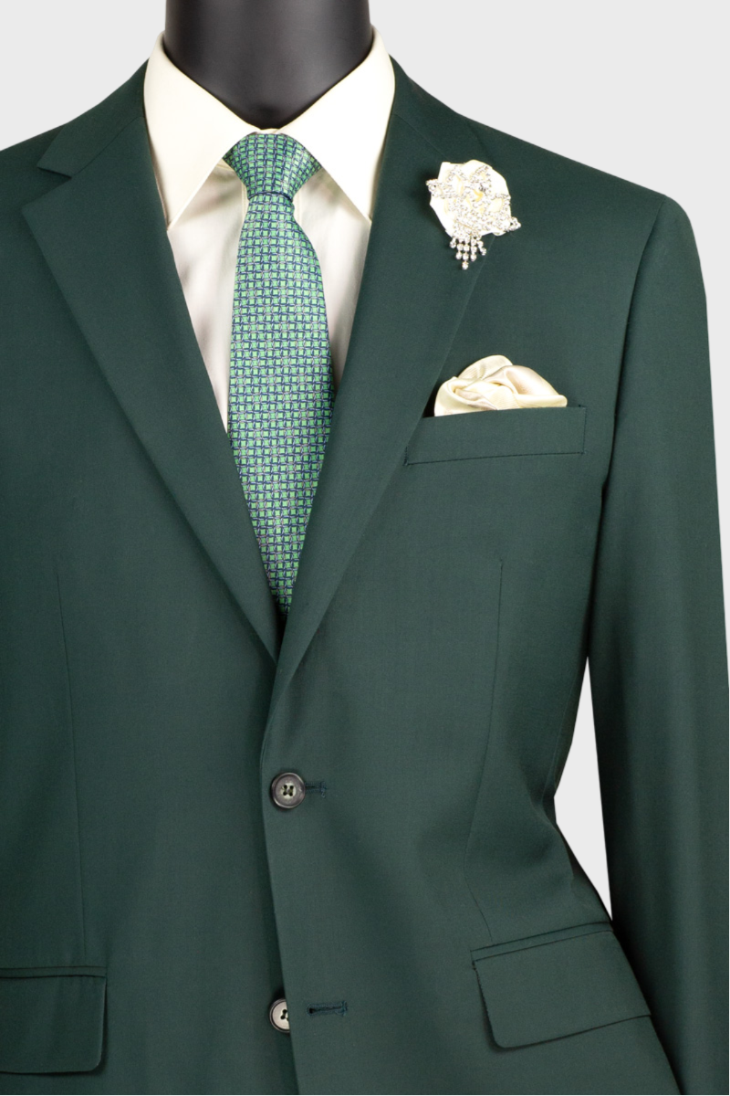 hunter green suit with flower pin